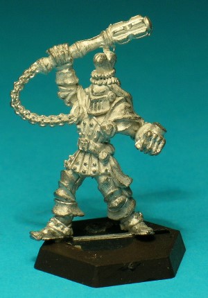 Pose 3. This figure wears a suit of full plate armour with studded and banded tassets and leather boots. He has a great helm with a closed visor and a heart-motif crest. He wields a heavy mace with a long chain hanging from the pommel and he has a shield stud on his left hand. Pose 3. This figure wears a suit of full plate armour with studded and banded tassets and leather boots. He has a great helm with a closed visor and a heart-motif crest. He wields a heavy mace with a long chain hanging from the pommel and he has a shield stud on his left hand.