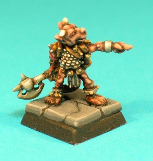 Pose 4, variant A. This figure appears to be a Kobold leader, armed with a handaxe in his right hand, and pointing with his left. He is looking to his left and has 2 long, pointed horns and small ears, with a closed, smiling mouth.