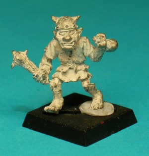 Pose 3, variant B. This Goblin wears a horned round steel helmet with a rivetted rim, and he is looking straight forwards. His partly open mouth has upper fangs barely visible.