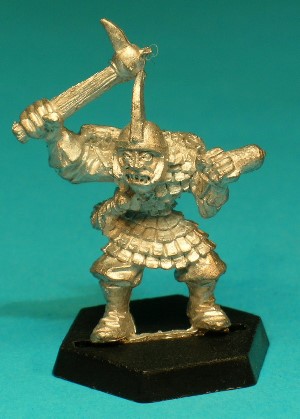 Pose 1, variant C. This variant wields a mace with a spiked ball with one long, curved spike (a bec-de-corbin?). He wears a plain round helmet adorned with a tall, backwards-curving fin and curved cheekguards. His head looks forwards, with an open snarling mouth
