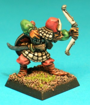 Pose 3, variant B. This variant wears a conical hat with a flat top, with a small crescent-shaped symbol on the front, and a scalemail neckguard. His head looks along the firing line of his arrow, with a closed, grinning mouth.