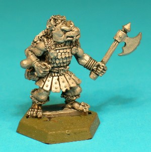 Pose 1, variant C. This variant is bareheaded revealing short mohican-style hair with 2 ponytails. His axe has a notched single blade and top spike. He has a dog-like face with a short muzzle, and a snarling mouth with protruding long upper fangs. He is looking slightly left and has no earrings. Pose 1, variant C. This variant is bareheaded revealing short mohican-style hair with 2 ponytails. His axe has a notched single blade and top spike. He has a dog-like face with a short muzzle, and a snarling mouth with protruding long upper fangs. He is looking slightly left and has no earrings.