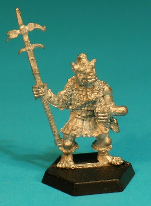Pose 3, variant C. This variant is bare-headed, revealing a short topknot, and a long beard gathered in a braid. His polearm is a lucerne hammer, with a pair of extra 'unsaddling' hooks below a spike hammer head. The Gnoll has a narrow dog-like face with a short muzzle, and a closed mouth with protruding upper fangs. His head is level and he looks straight forwards and he has no earrings. Pose 3, variant C. This variant is bare-headed, revealing a short topknot, and a long beard gathered in a braid. His polearm is a lucerne hammer, with a pair of extra 'unsaddling' hooks below a spike hammer head. The Gnoll has a narrow dog-like face with a short muzzle, and a closed mouth with protruding upper fangs. His head is level and he looks straight forwards and he has no earrings.