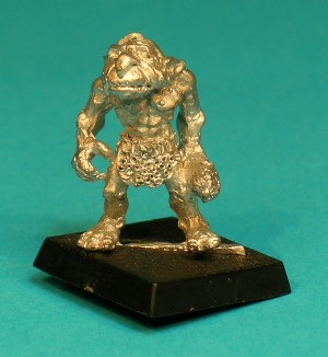 Pose 2, variant A. This Norker is armed with a short, one-handed club held by his left knee. His right hand position varies, and he is naked except for a belt and ring-studded loincloth. This particular variant holds his right hand open by his right thigh, and looks to his front with his mouth closed and a pair of small fangs protruding.  