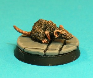 Pose 3. This small rat looks like the runt of the litter, sitting in a hunched position, and with a short tail. Definitely only one hit point!