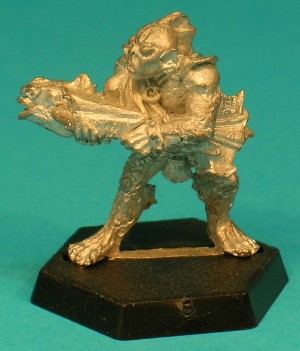 Pose 1, variant C. This variant has a small, narrow head, with small, rounded ears and a swept-back, 3-spined fin on the back of his head. He has small, round eyes and his mouth is partly open showing his teeth. His head looks slightly left of the line of his crossbow. Pose 1, variant C. This variant has a small, narrow head, with small, rounded ears and a swept-back, 3-spined fin on the back of his head. He has small, round eyes and his mouth is partly open showing his teeth. His head looks slightly left of the line of his crossbow.