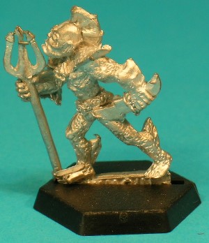 Pose 3, variant E. This figure has a large, round head, with small, pointed ears and a tall, 3-spined fin on the back of his head. He has small, oval eyes, his mouth is closed and downturned with an undershot lower jaw, and his head is turned slightly to his right. Pose 3, variant E. This figure has a large, round head, with small, pointed ears and a tall, 3-spined fin on the back of his head. He has small, oval eyes, his mouth is closed and downturned with an undershot lower jaw, and his head is turned slightly to his right.