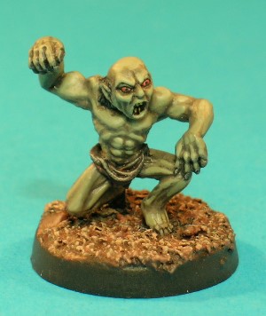 Pose 2, variant A. This is the first of 2 versions of the Ghast, which was replaced by a remodelled version in 1986. This figure wears a tattered loincloth and crouches with his right knee touching the ground, his right arm raised and his left hand resting on his left knee. This variant has a balding head, but with some staggly hair at the back. He looks downwards and to his left with his mouth open in a shout. Pose 2, variant A. This is the first of 2 versions of the Ghast, which was replaced by a remodelled version in 1986. This figure wears a tattered loincloth and crouches with his right knee touching the ground, his right arm raised and his left hand resting on his left knee. This variant has a balding head, but with some staggly hair at the back. He looks downwards and to his left with his mouth open in a shout.
