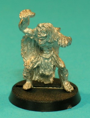 Pose 4, variant D. This variant has long, straggly hair with a centre-parting. It has a near-skeletal face with its mouth open barring its teeth, and looks slightly to its right. Pose 4, variant D. This variant has long, straggly hair with a centre-parting. It has a near-skeletal face with its mouth open barring its teeth, and looks slightly to its right.