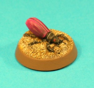 Figure 1, Fire Beetle I.<br>This is the first of a pair of Fire Beetles. This one has his body raised upwards at the rear. Figure 1, Fire Beetle I.<br>This is the first of a pair of Fire Beetles. This one has his body raised upwards at the rear.