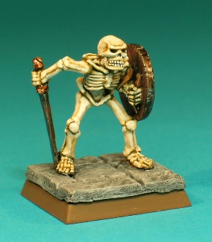 Figure 8, Skeleton.<br>This is a very nicely sculpted Skeleton, standing in a menacing pose, armed with a longsword and a battered shield. Figure 8, Skeleton.<br>This is a very nicely sculpted Skeleton, standing in a menacing pose, armed with a longsword and a battered shield.